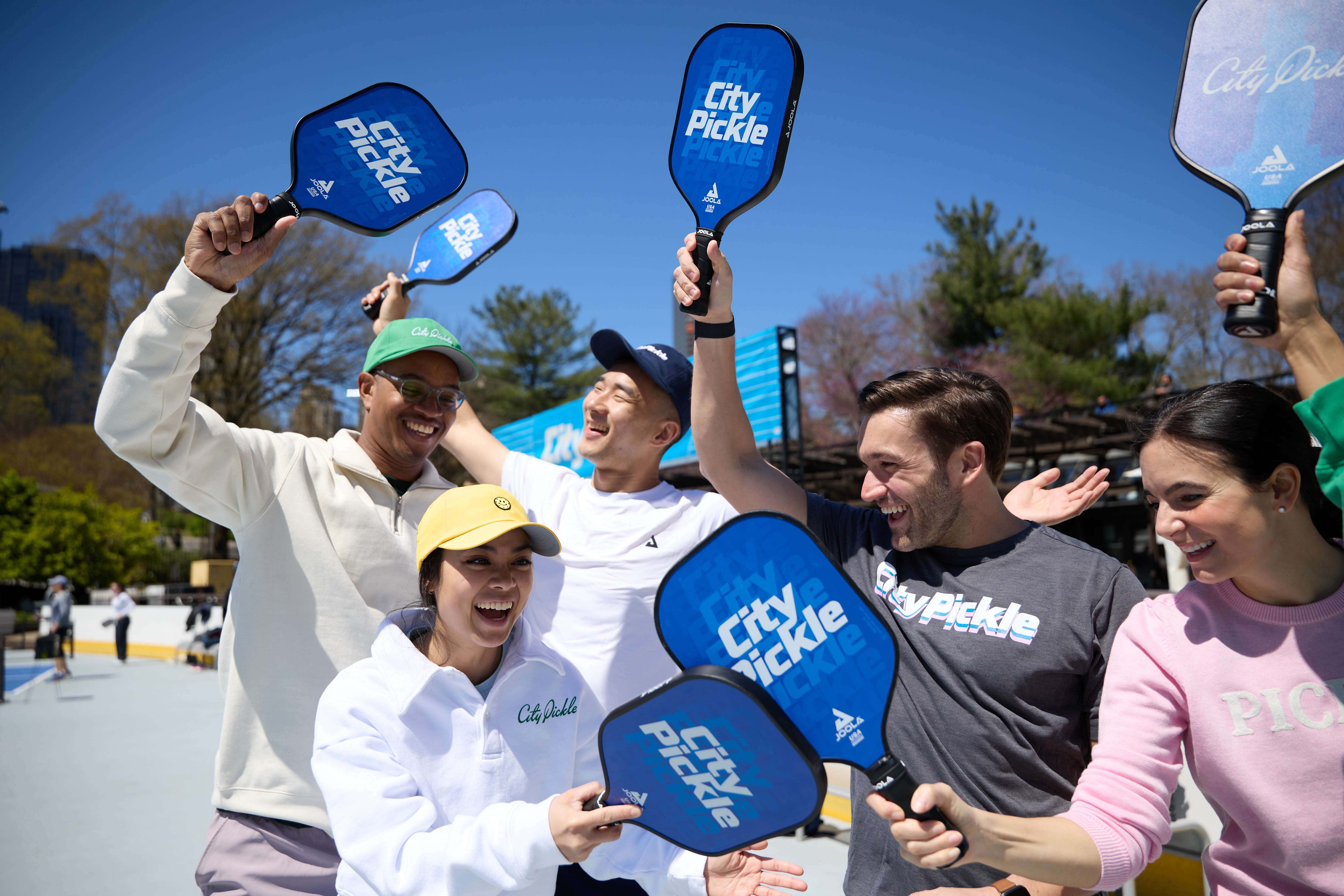 People socializing after playing pickleball